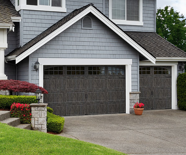 COMMERCIAL STEEL PANEL DOORS - Garage Doors - Ideal